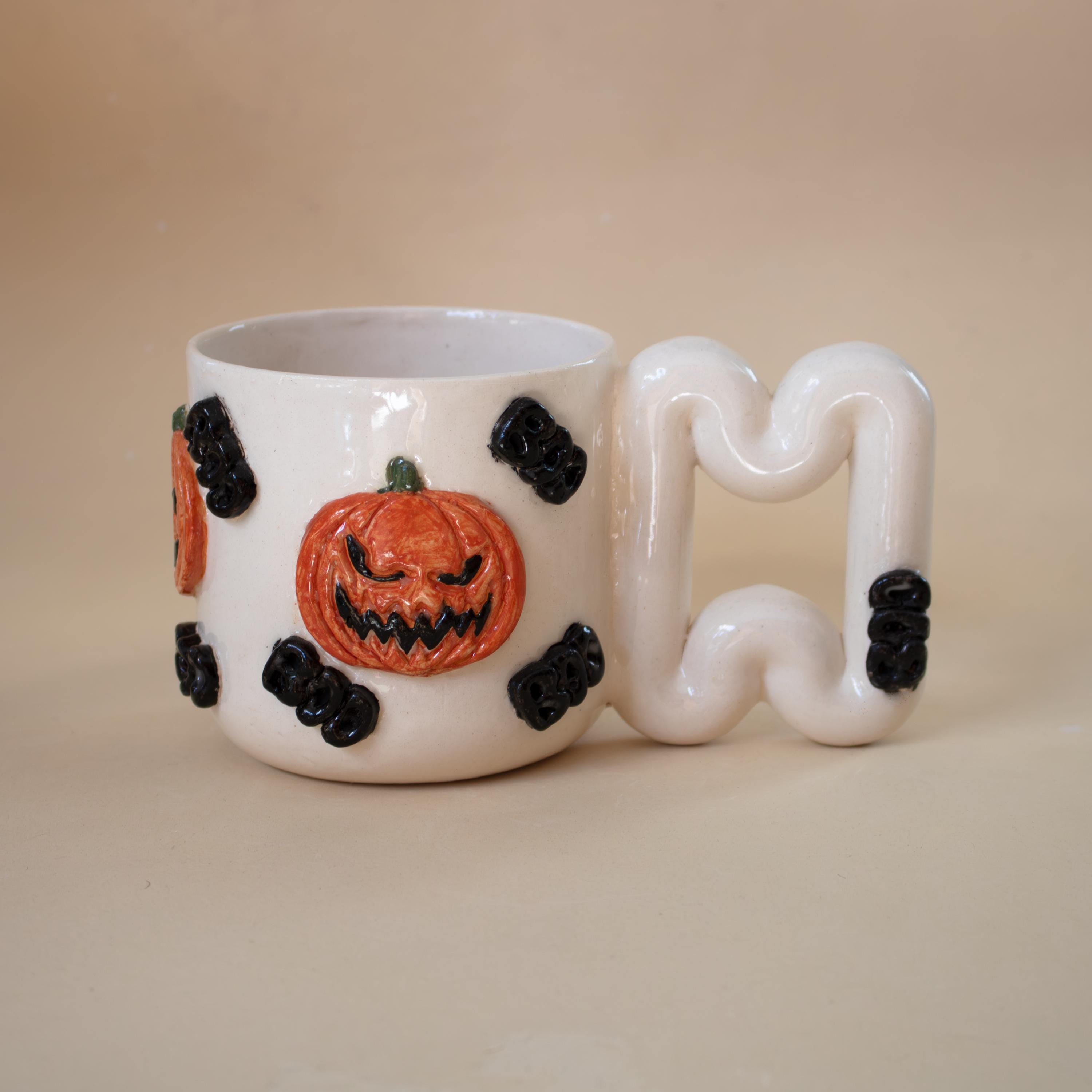 Halloween pumpkin porcelain mug with funky handle: spooky coffee cup
