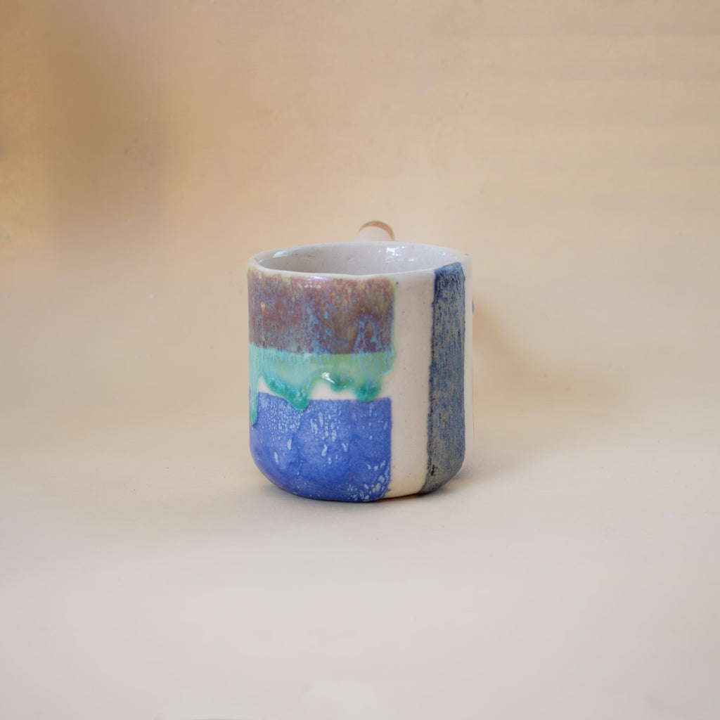 Handmade Porcelain Coffee Mug: Colourful Geometric Design, Wavy Handle