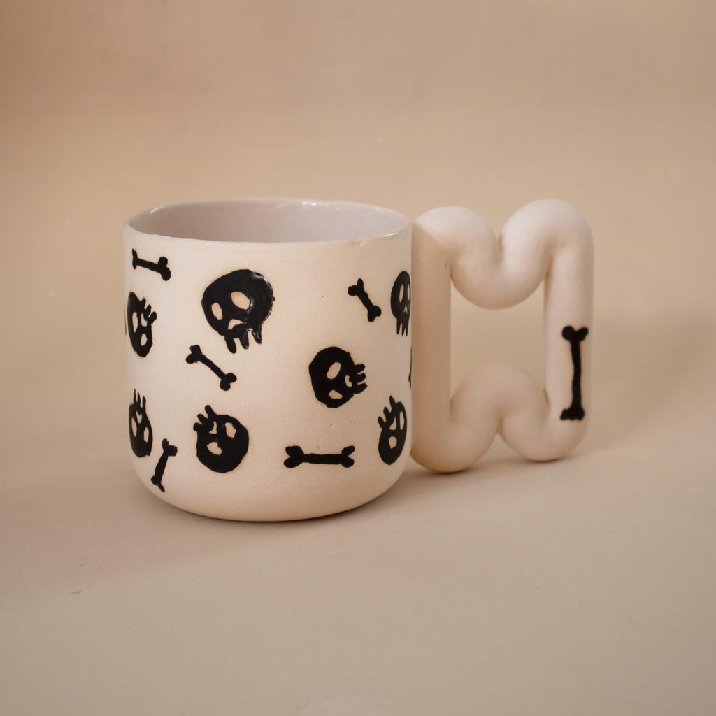Handmade Porcelain skull Mug: Spooky Black Coffee Cup with Funky Handle