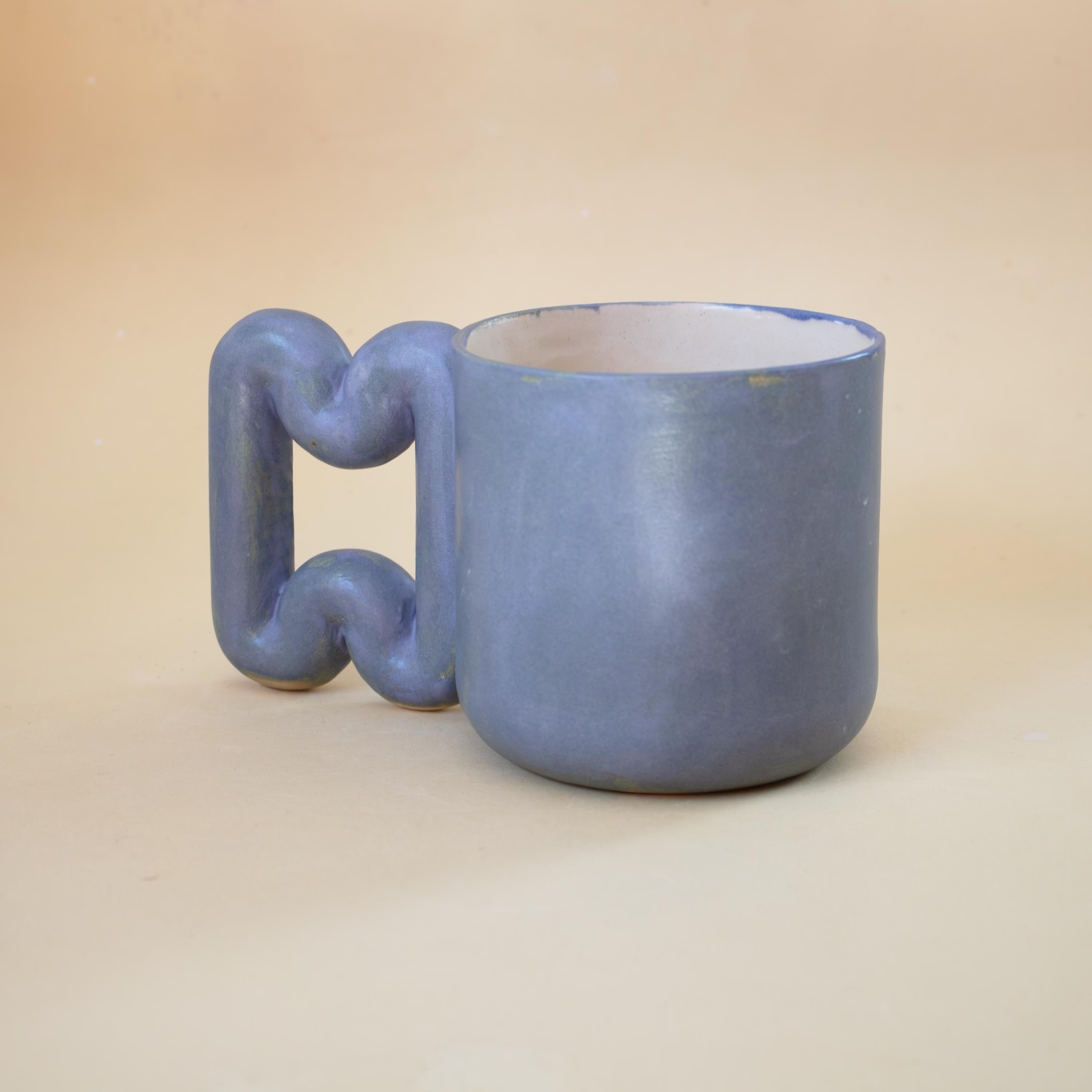 Matte blue porcelain mug with funky handle, handmade modern coffee cup
