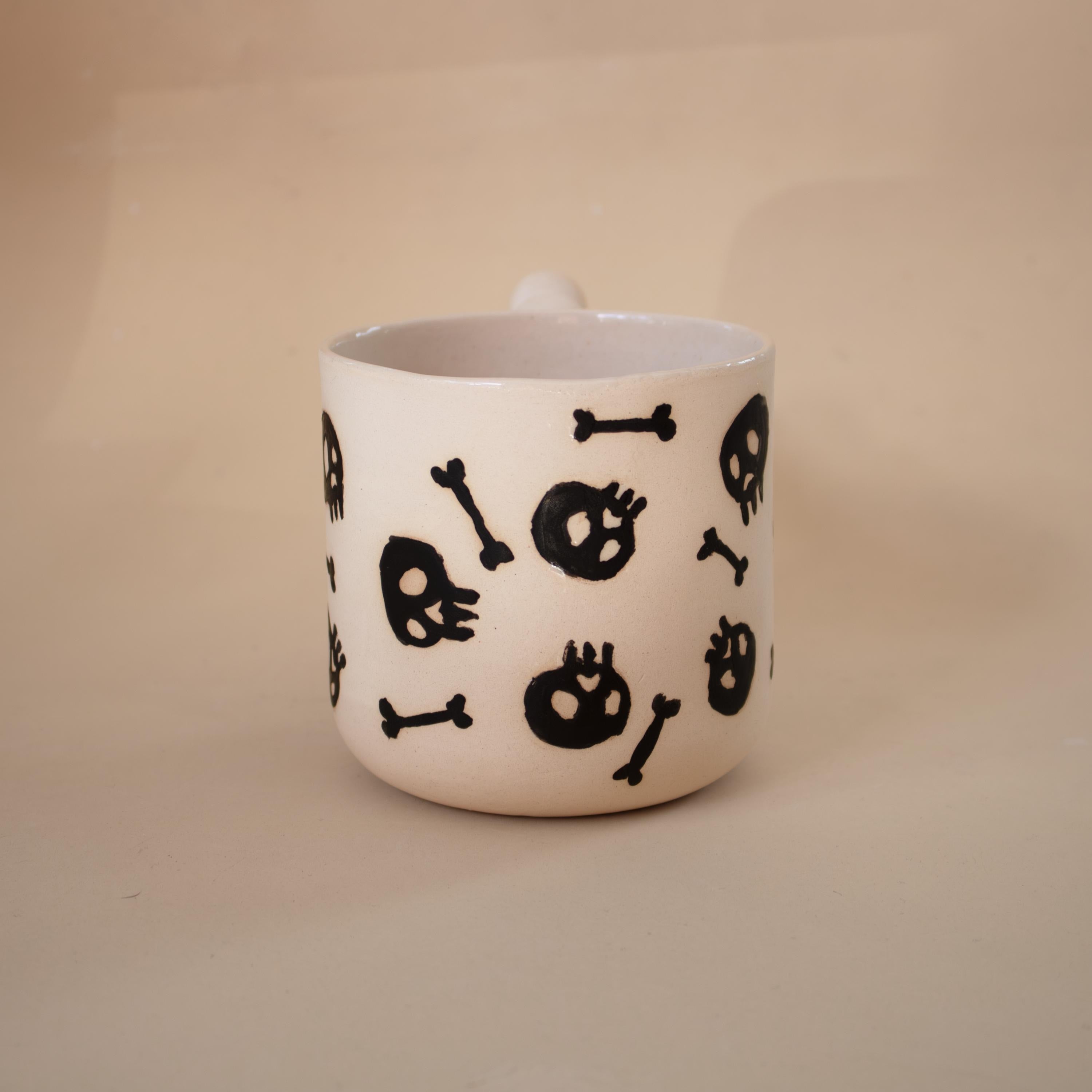 Handmade Porcelain skull Mug: Spooky Black Coffee Cup with Funky Handle