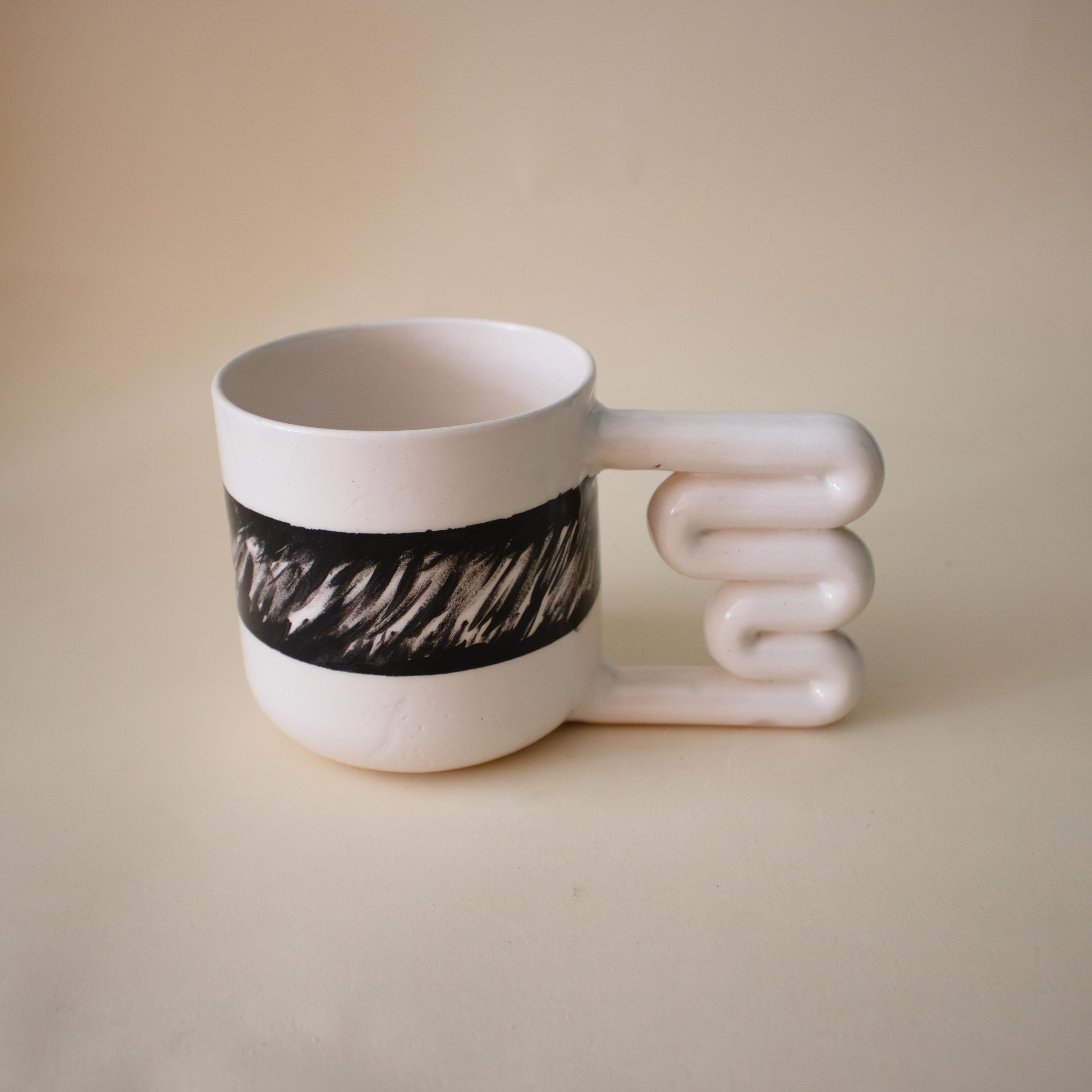 Black and white porcelain mug with funky handle Handmade Ceramic Cup