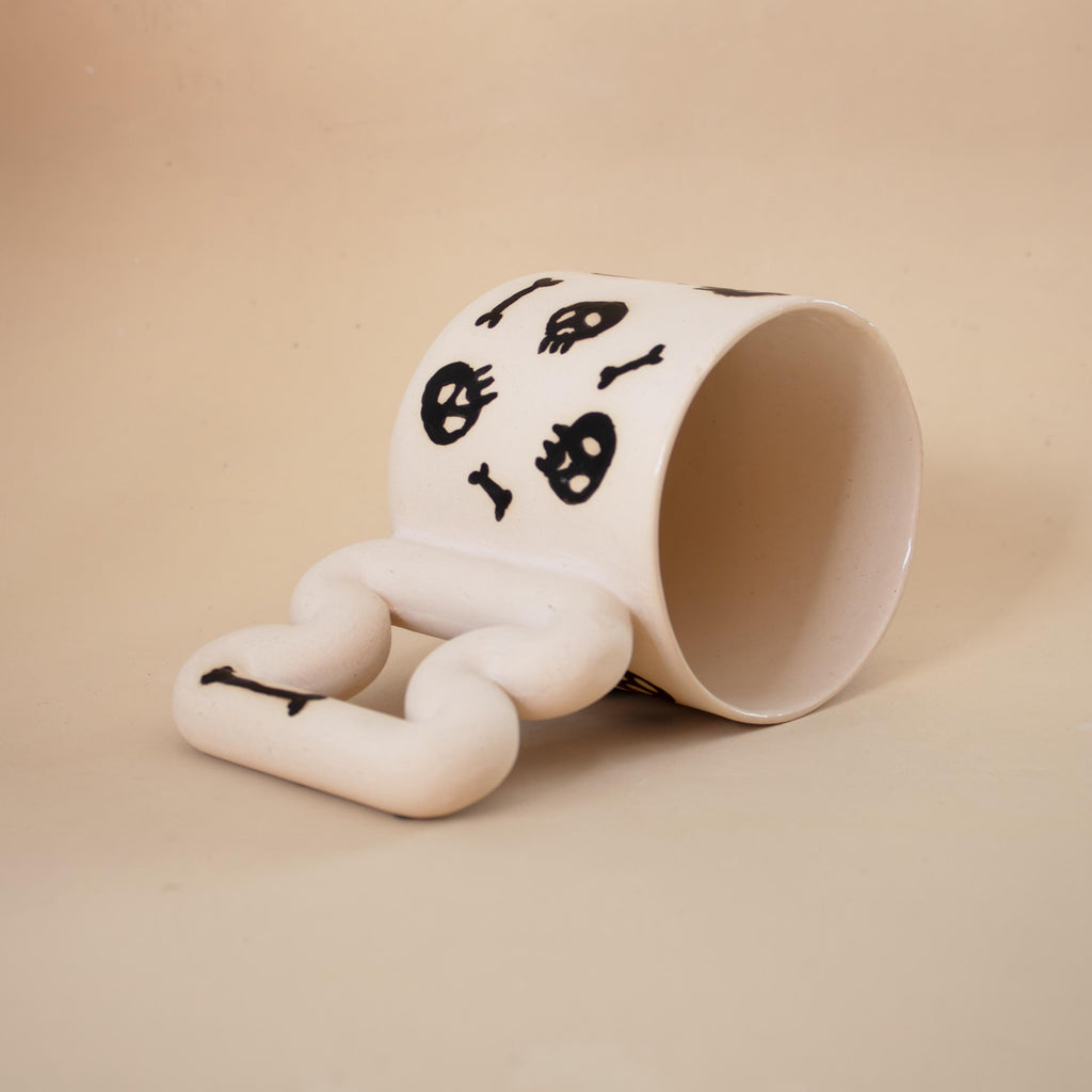 Handmade Porcelain skull Mug: Spooky Black Coffee Cup with Funky Handle