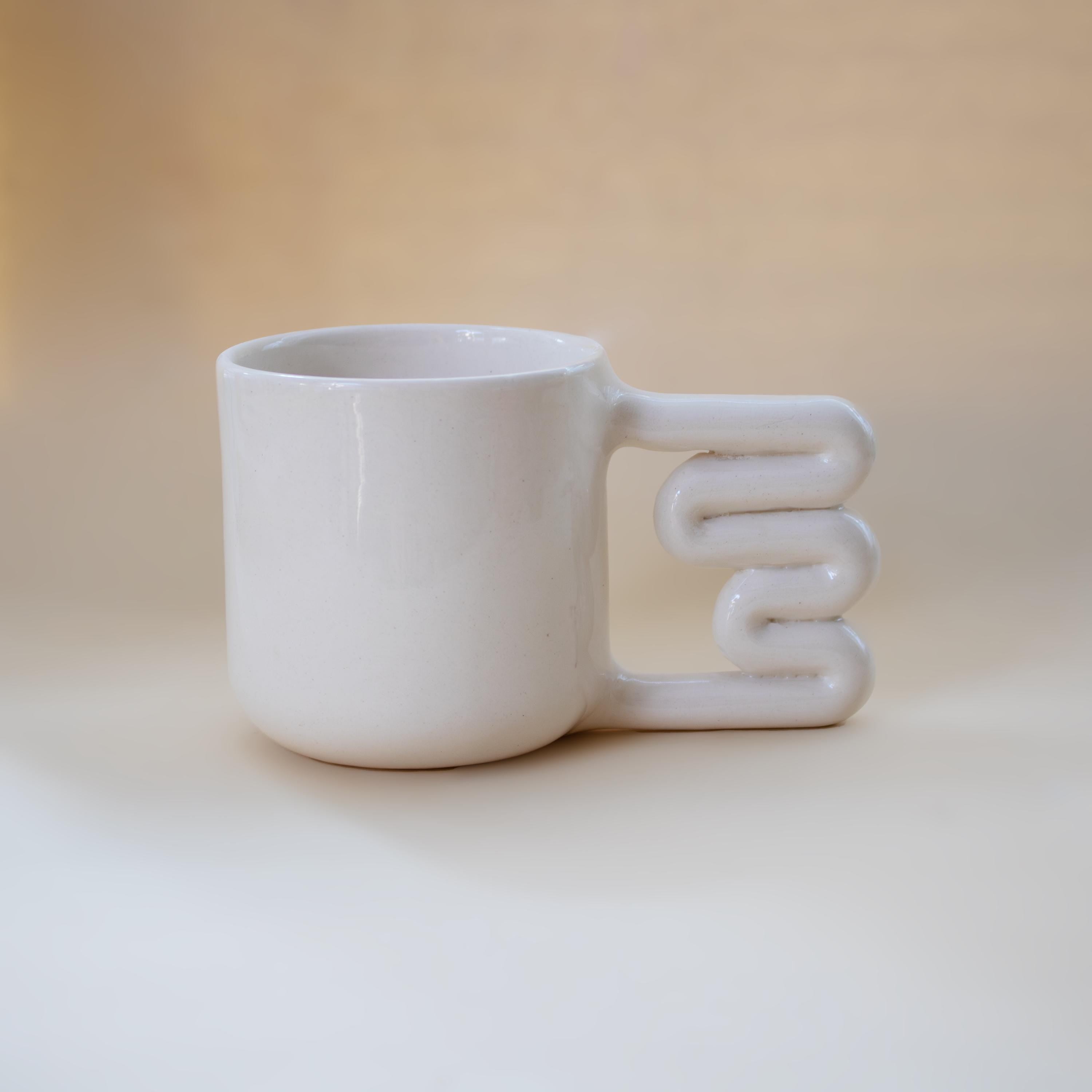 Handmade Porcelain Mug: Minimalist Design with Funky Handle