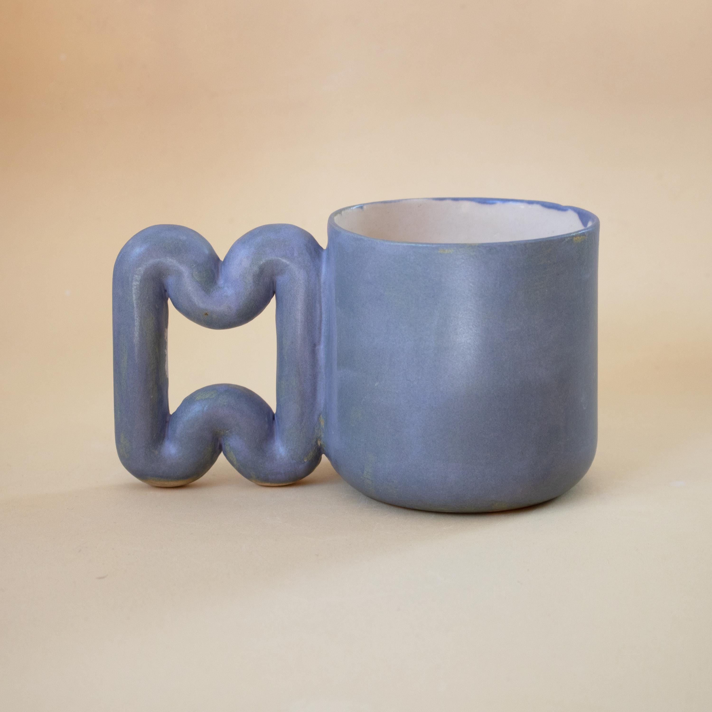 Matte blue porcelain mug with funky handle, handmade modern coffee cup