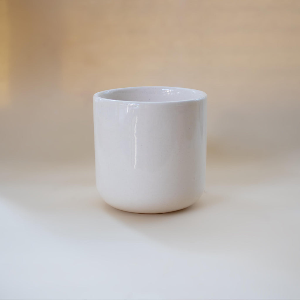 Handmade Porcelain Mug: Minimalist Design with Funky Handle