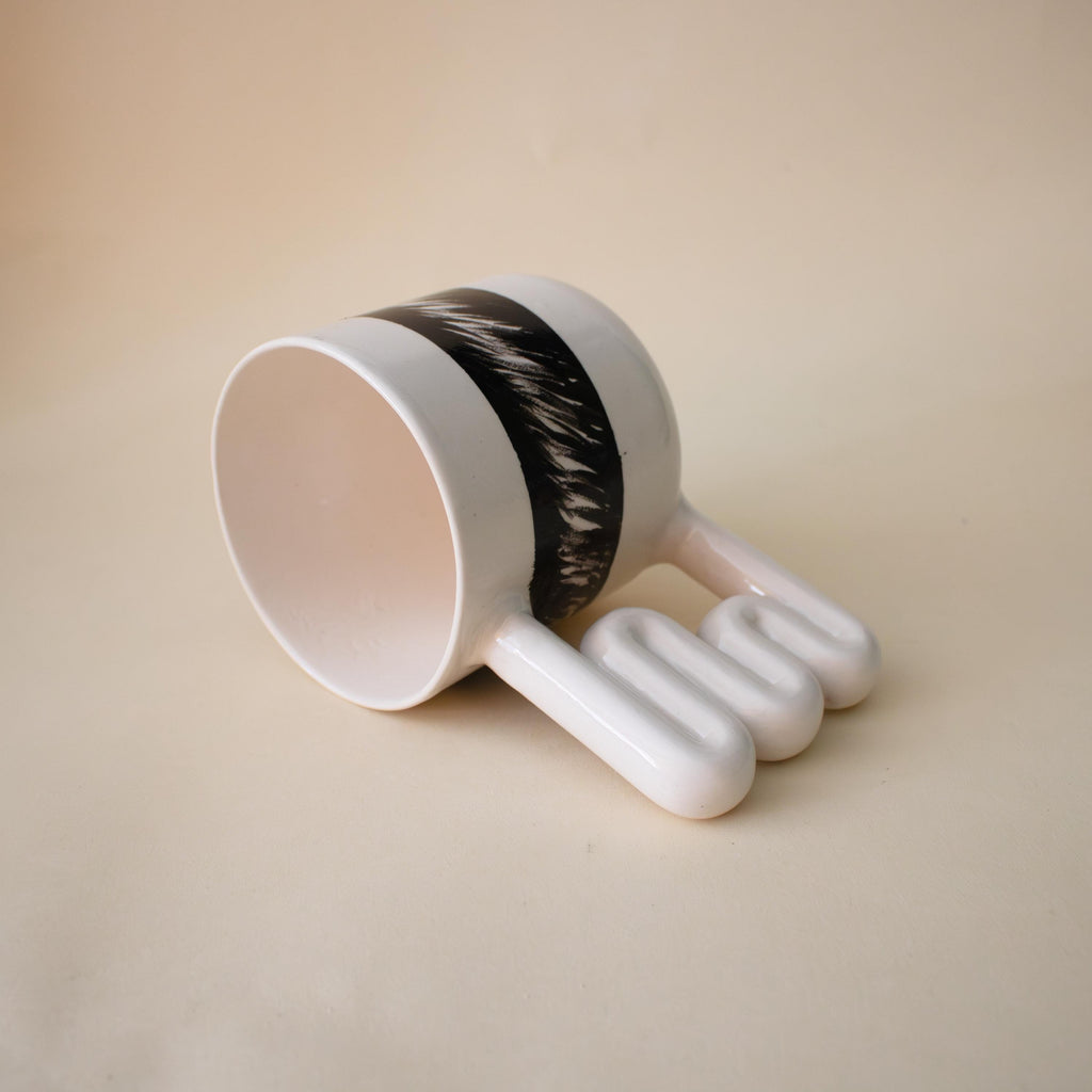 Handmade Porcelain Coffee Mug: Wavy Handle, Black & White Ceramic