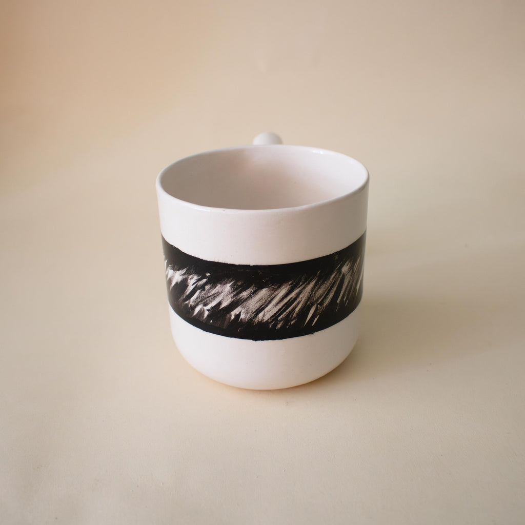 Black and white porcelain mug with funky handle Handmade Ceramic Cup