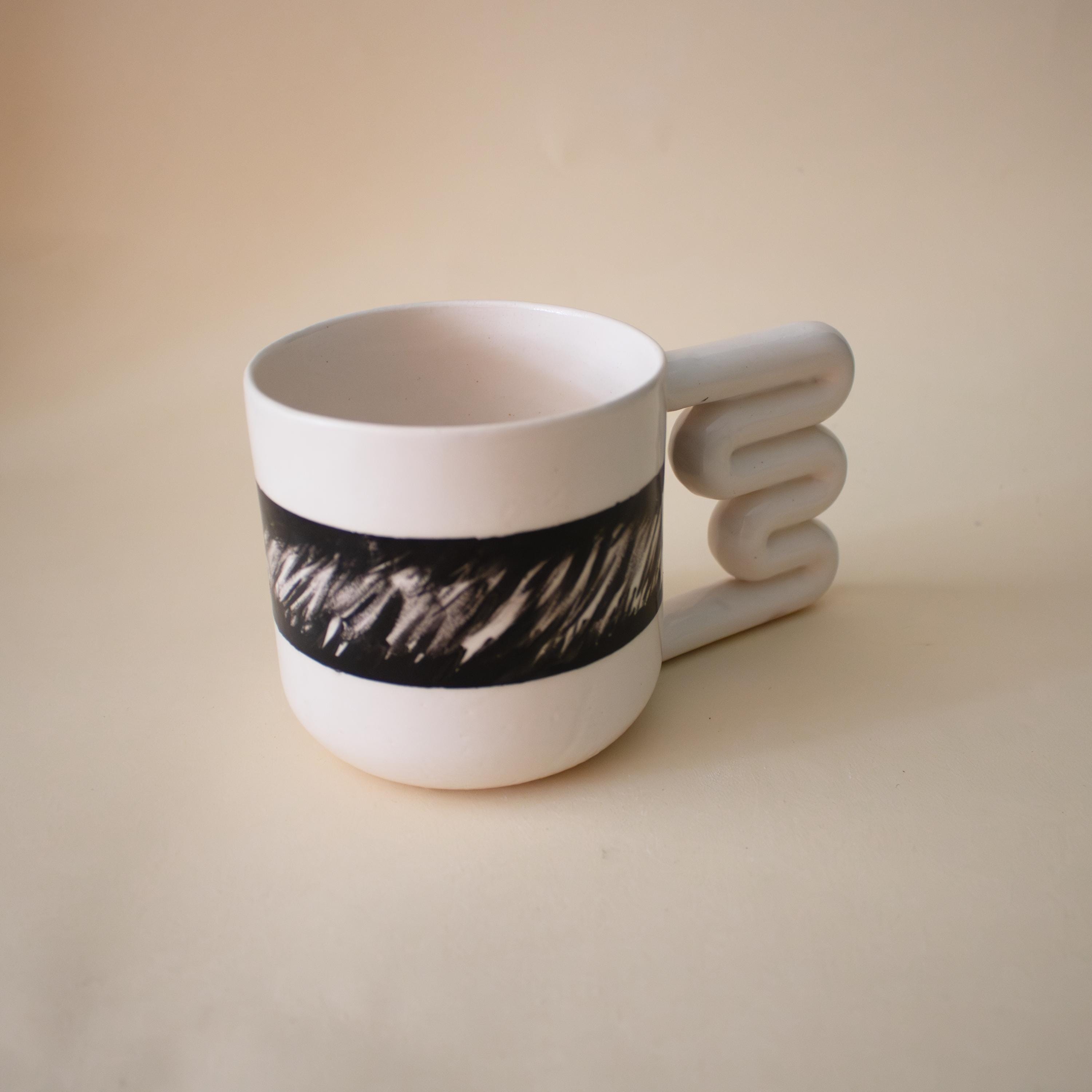 Handmade Porcelain Coffee Mug: Wavy Handle, Black & White Ceramic