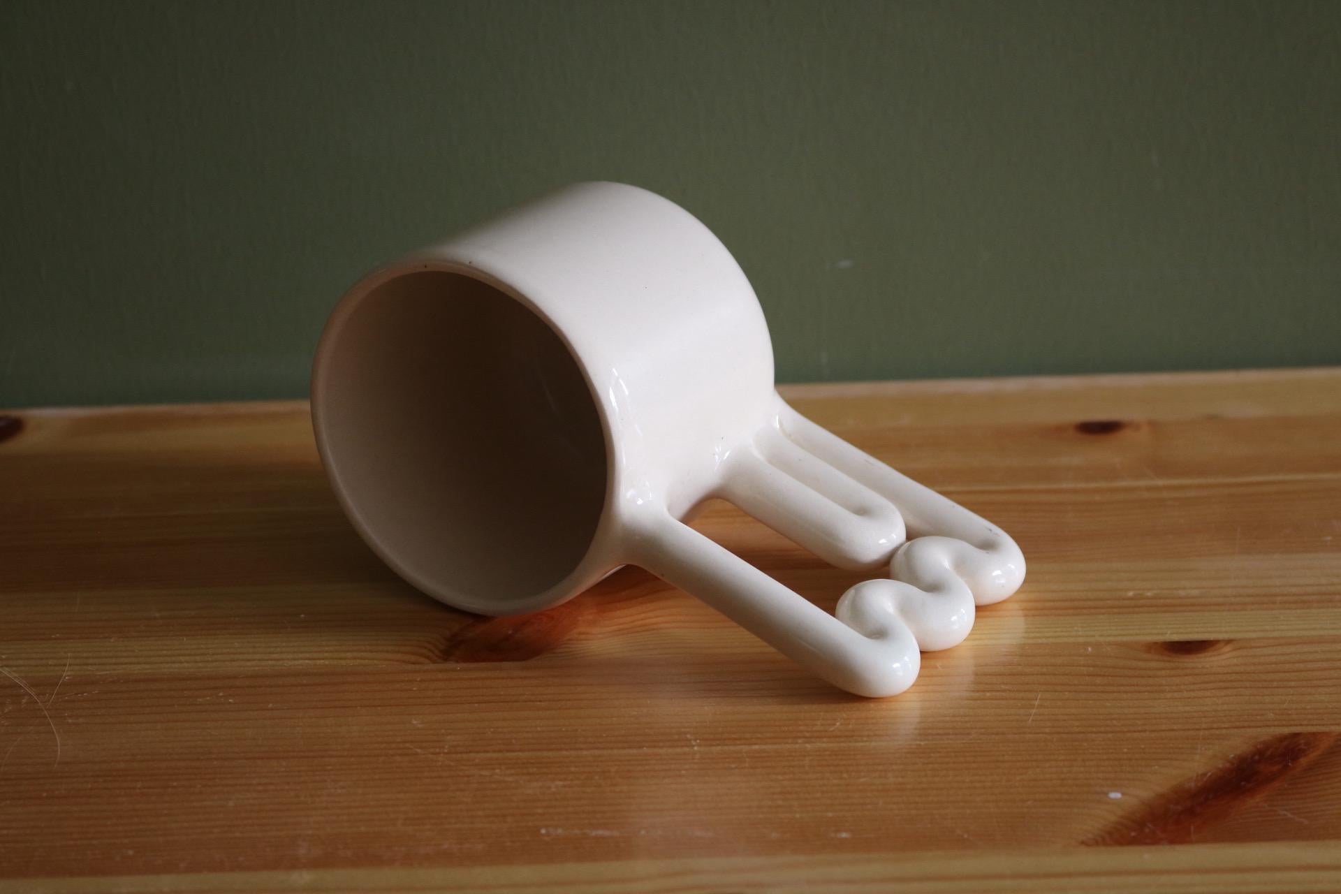 Handmade Porcelain Coffee Mug: Unique Wavy Handle, Modern Ceramic Cup