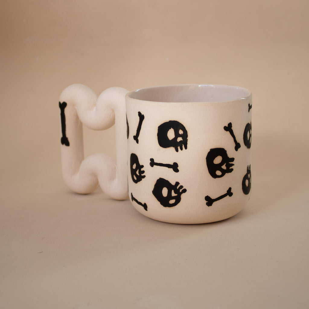 Handmade Porcelain skull Mug: Spooky Black Coffee Cup with Funky Handle