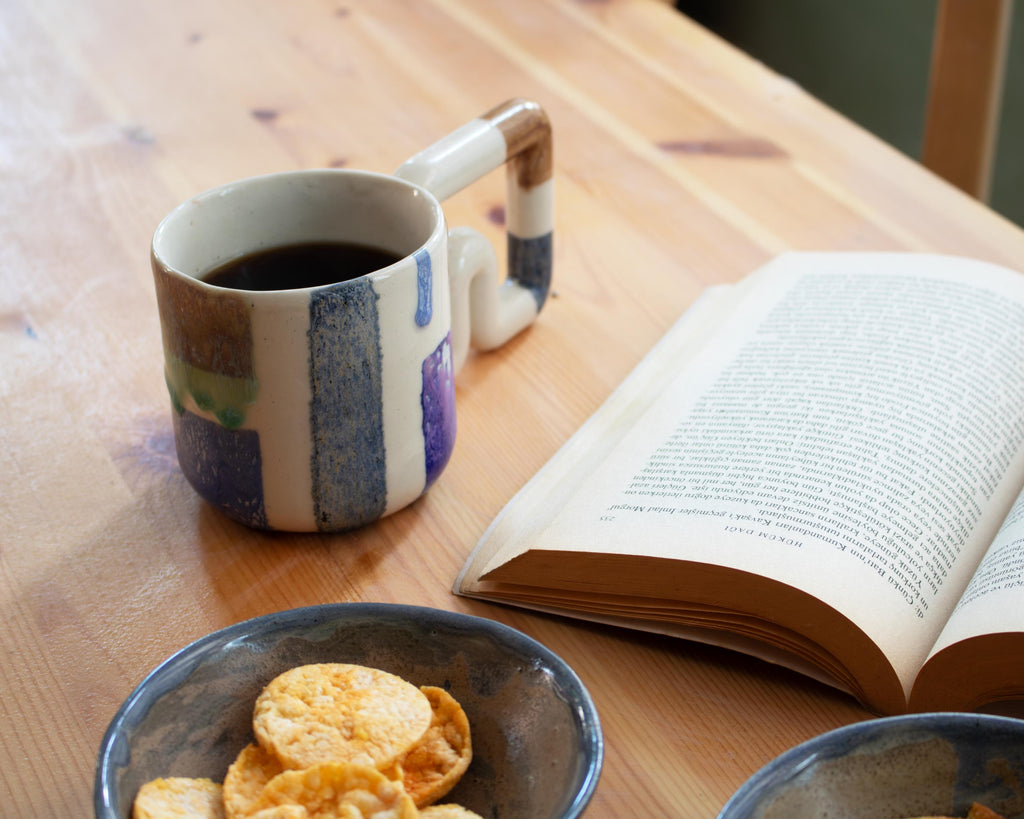 Handmade Porcelain Coffee Mug: Colourful Geometric Design, Wavy Handle