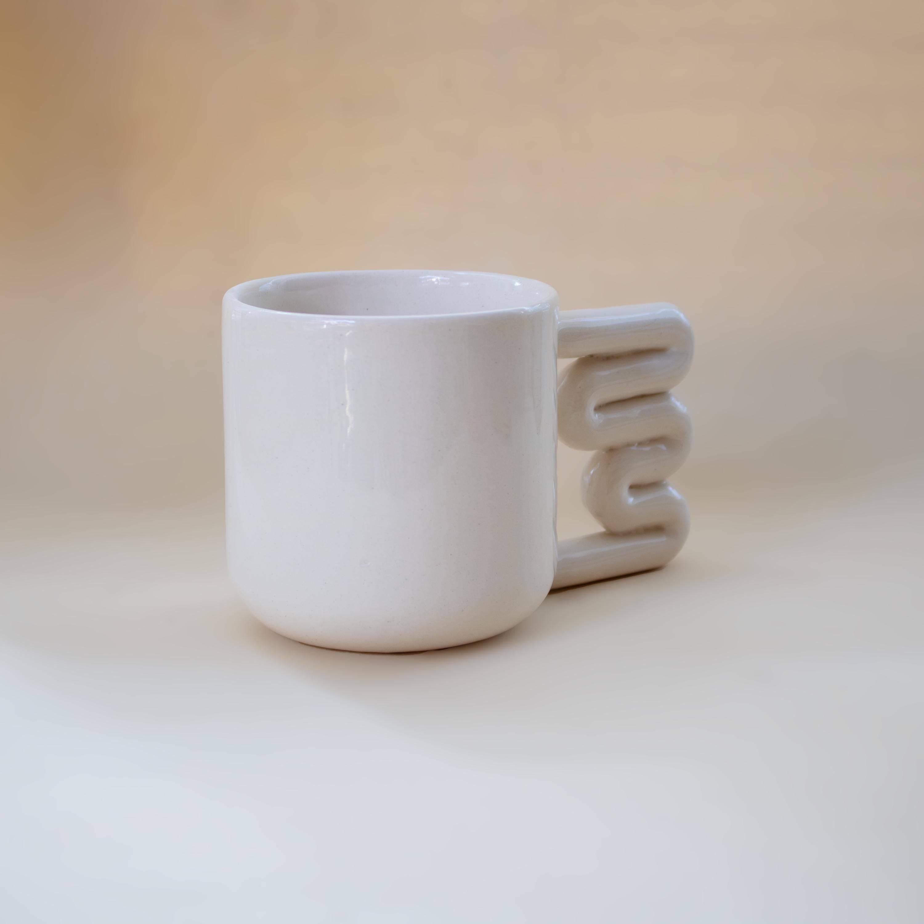 Handmade Porcelain Mug: Minimalist Design with Funky Handle