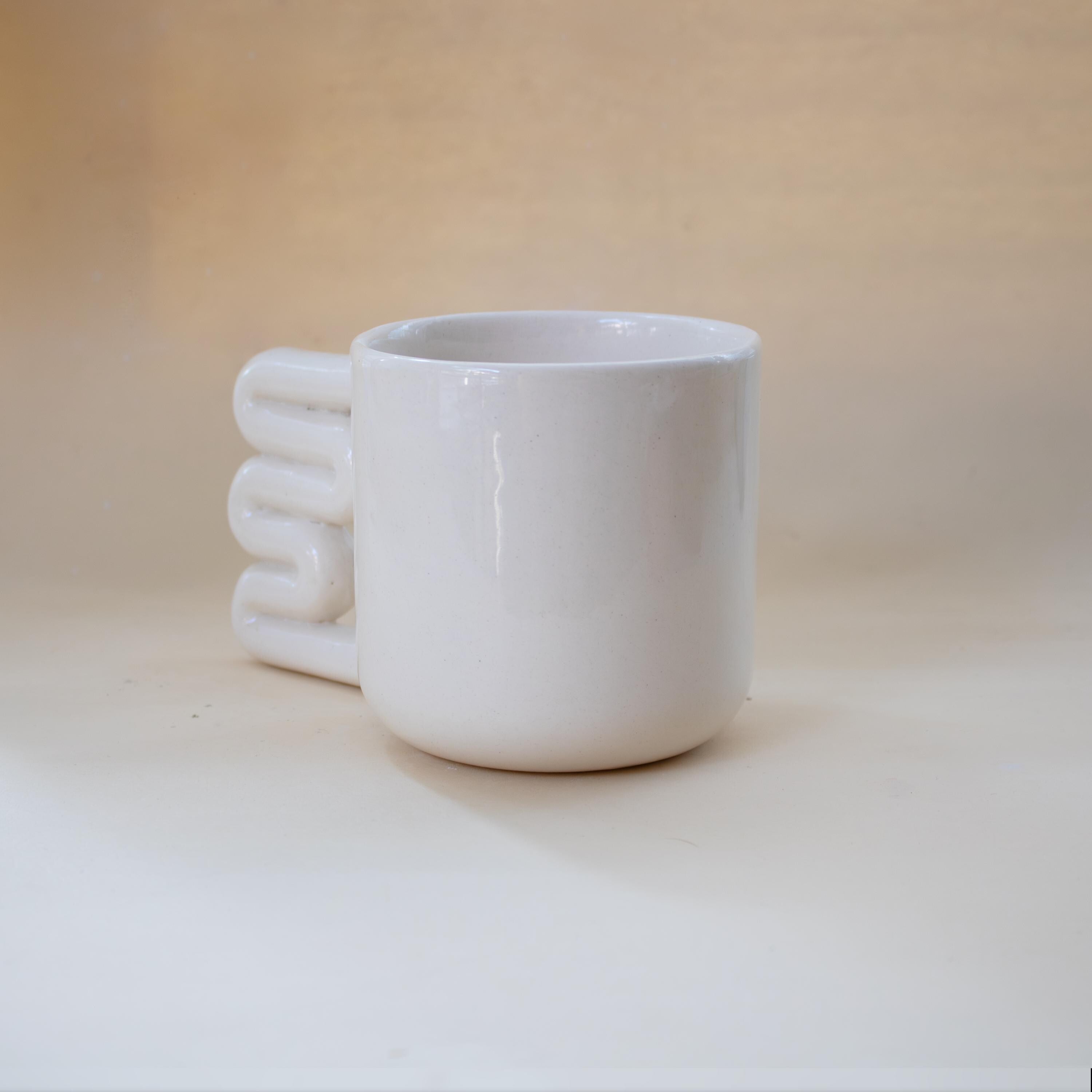 Handmade Porcelain Mug: Minimalist Design with Funky Handle