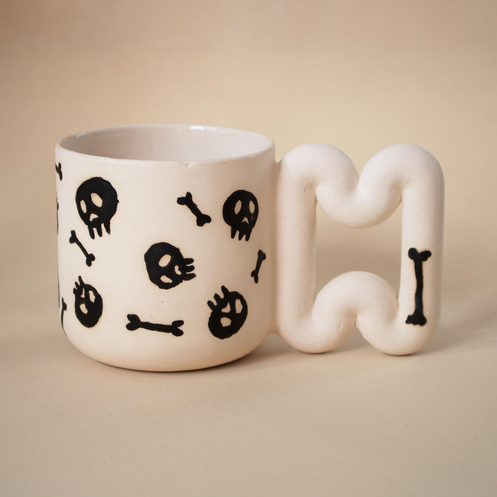 Handmade Porcelain skull Mug: Spooky Black Coffee Cup with Funky Handle