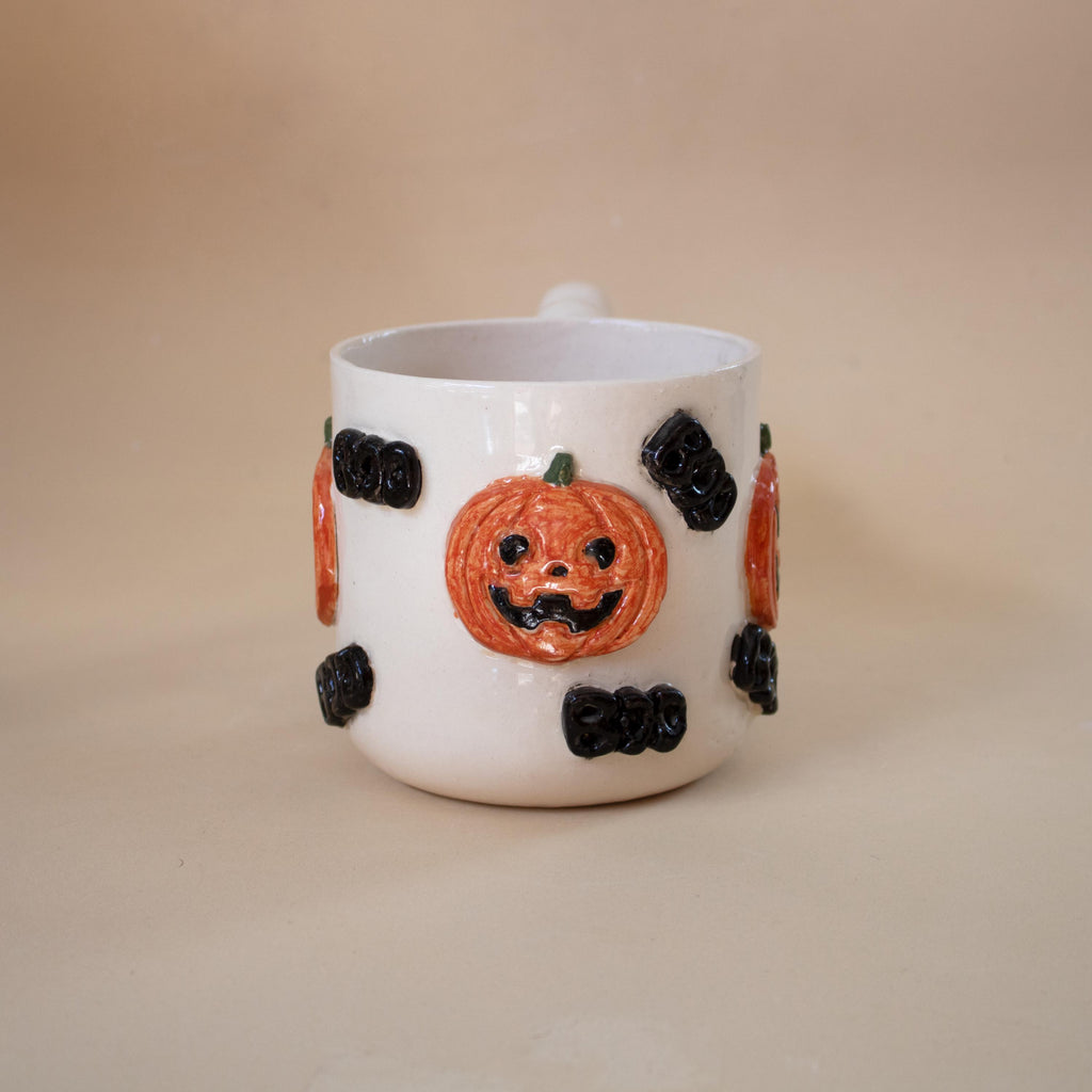Halloween pumpkin porcelain mug with funky handle: spooky coffee cup