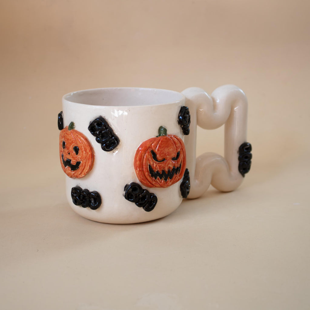 Halloween pumpkin porcelain mug with funky handle: spooky coffee cup