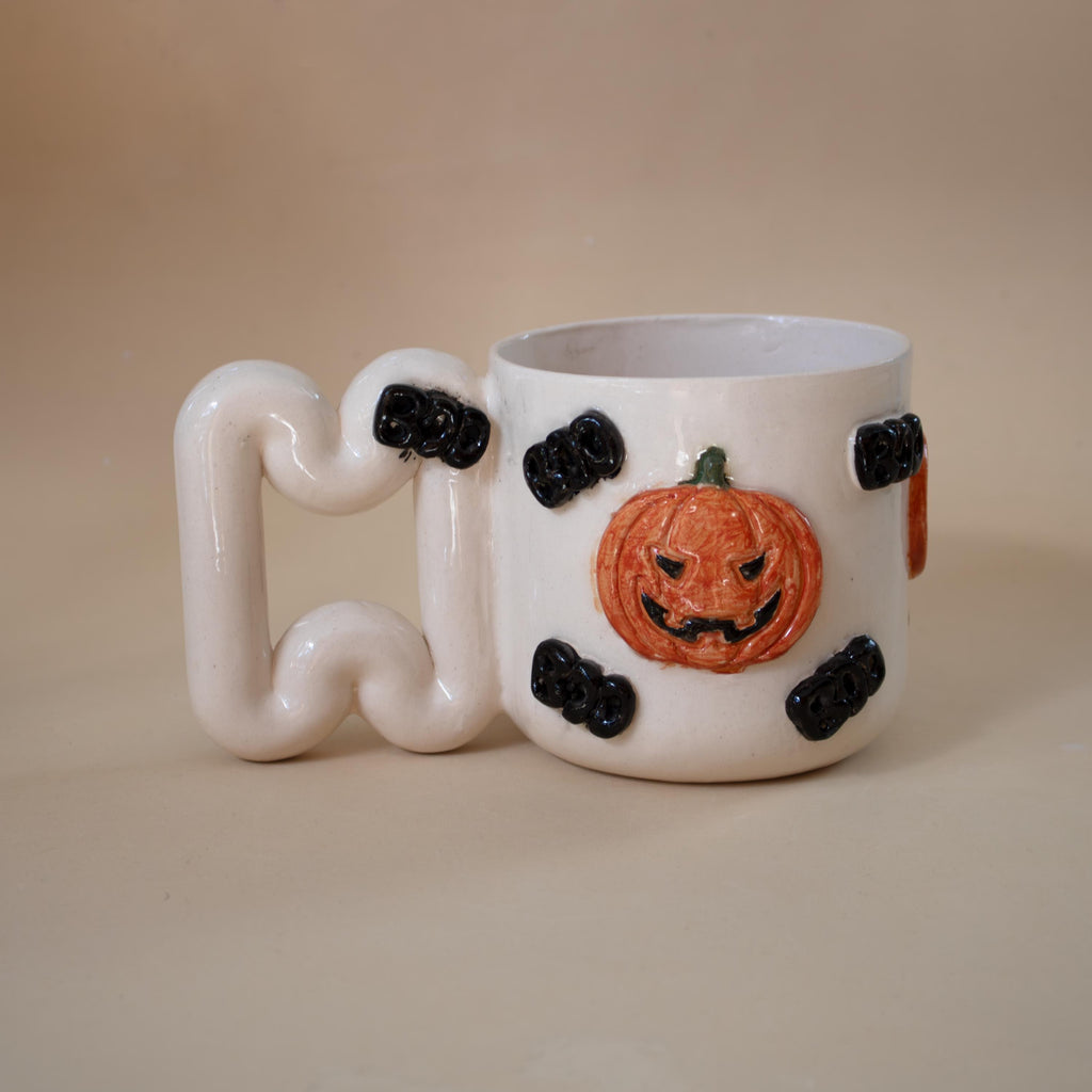 Halloween pumpkin porcelain mug with funky handle: spooky coffee cup