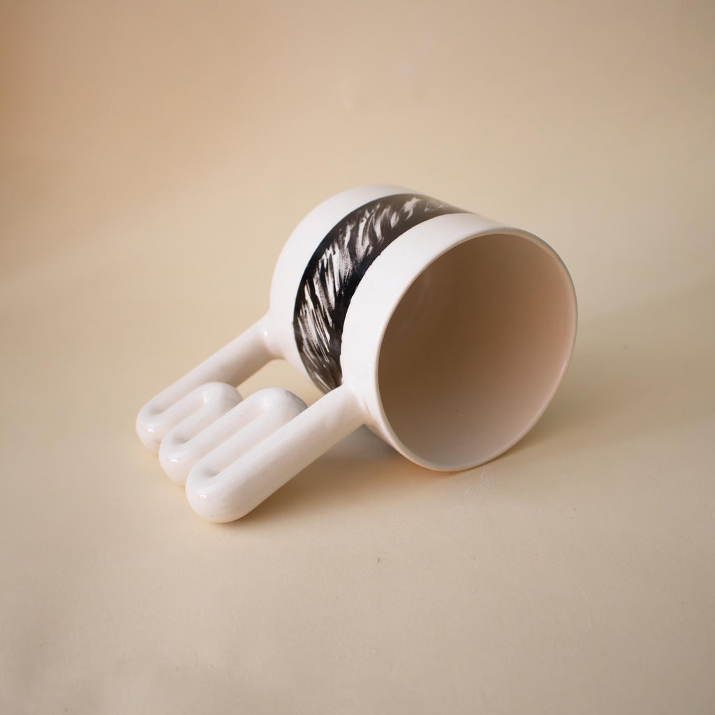 Black and white porcelain mug with funky handle Handmade Ceramic Cup