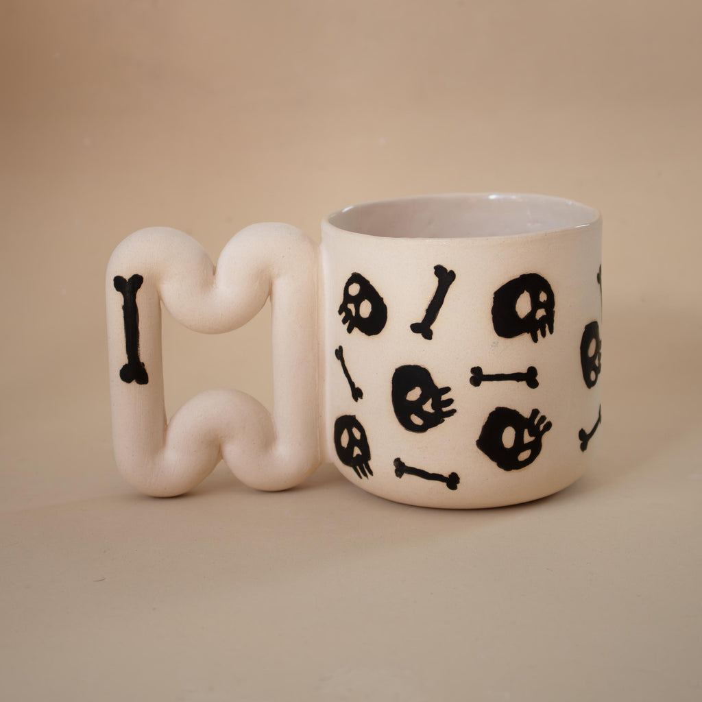 Handmade Porcelain skull Mug: Spooky Black Coffee Cup with Funky Handle